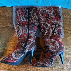 Diba Women’s tall boots. Size 7. Red, black & gold Paisley, print.
